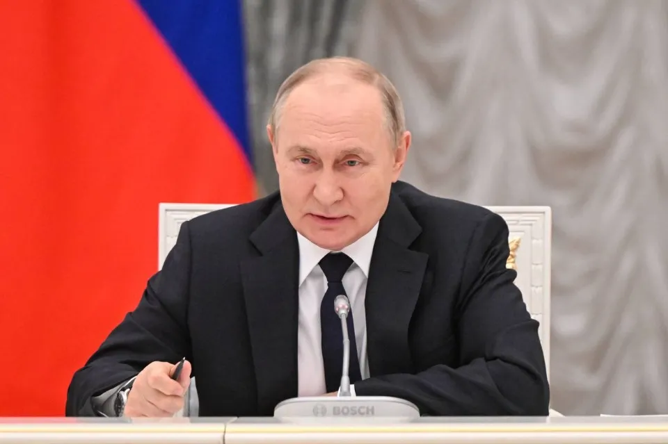 Путин