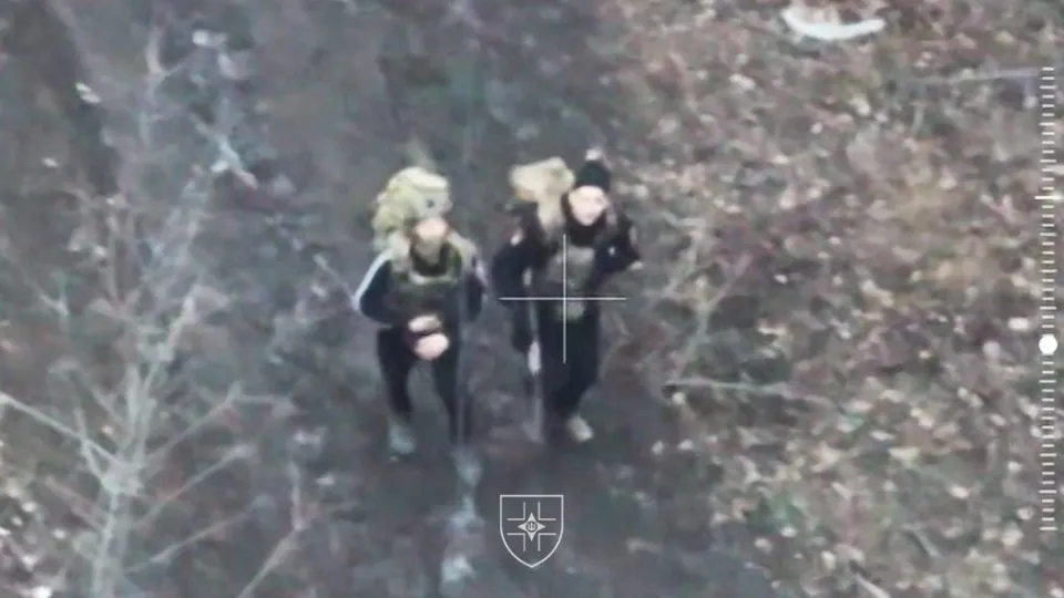 росіяни окупанти в цивільному одязі